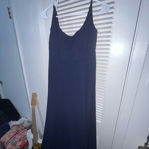 Navy blue prom dress with little straps and round neck.